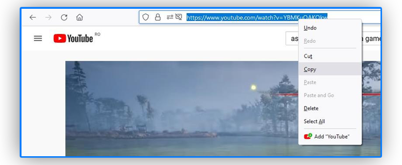 A screenshot of the YouTube homepage with someony copying the video URL.